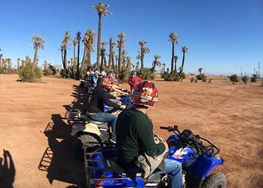 Bluespark team riding four wheelers in Morocco