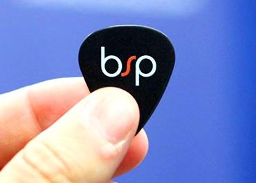 Guitar pick with Bluespark logo
