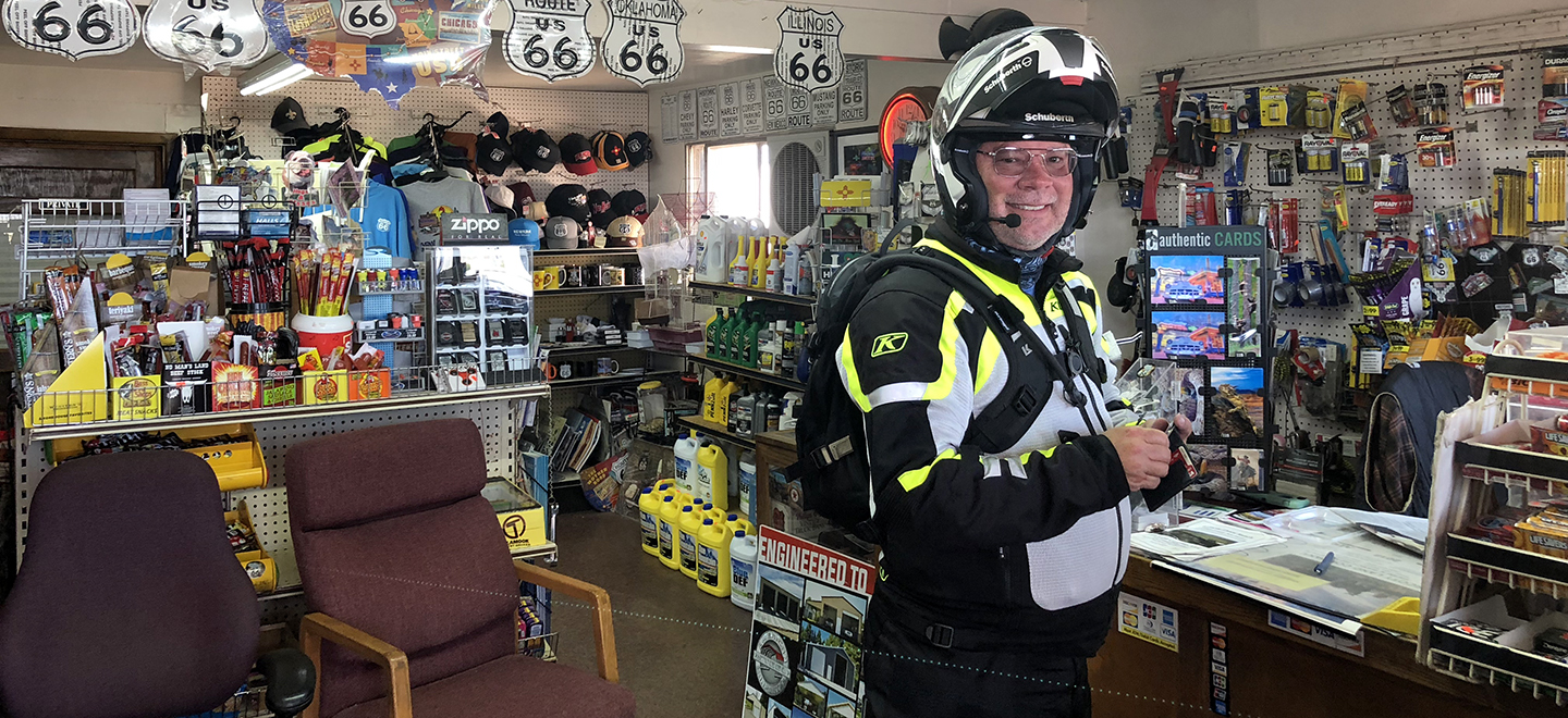 Michael Tucker in his motorcycle gear in Route 66 gas station