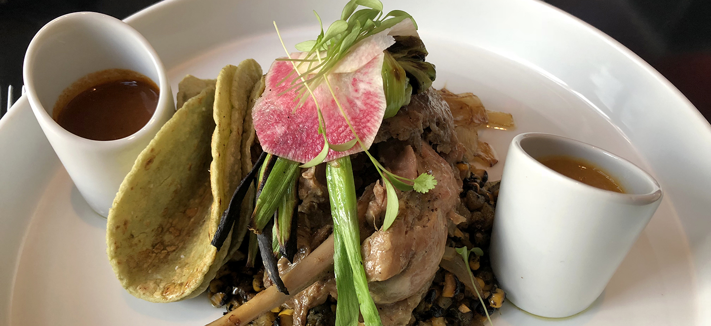 Duck confit with house made corn tortillas, mole amarillo, and charred corn.